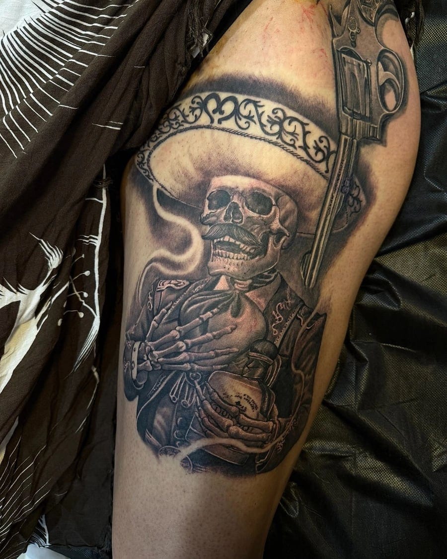 Black and grey tattoo of a skeleton in a charro sombrero holding a bottle, with a revolver above